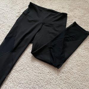 Black crop leggings with mesh panels